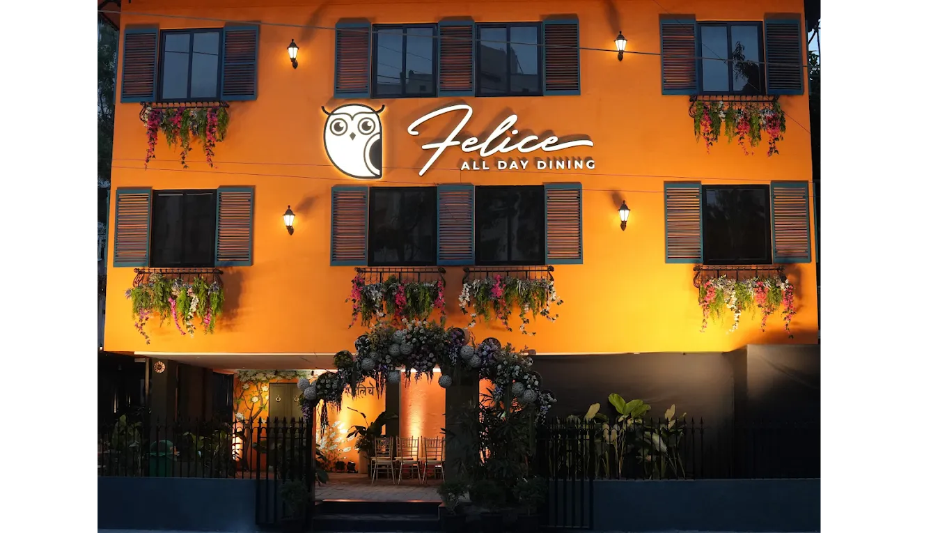 Felice All Day Dining seen from the street at dusk